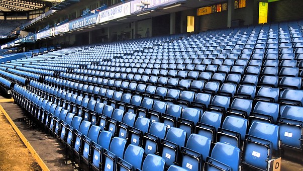 empty chairs on a football stadium